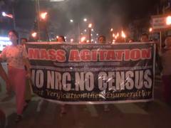 
      
      Meira Paibi hold torch rally in Imphal, demanding NRC update
      
      