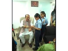 
      
      Students tie Rakhi to Delhi Minister Ashish Sood ahead of Raksha
      
      