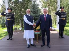 
      
      PM Modi, Uzbek Prez plant tree together 
      
      