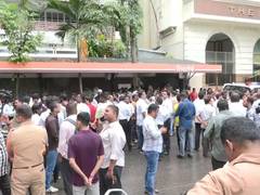 
      
      MNS workers gather outside Amit Thackeray's residence
      
      