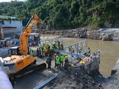 
      
      Nepal floods: Army builds rope bridge, deploys 20 helicopters
      
      