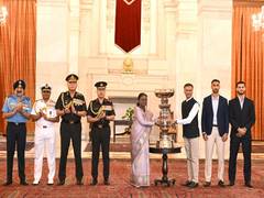 
      
      East Bengal FC receive President's Cup from prez Murmu
      
      