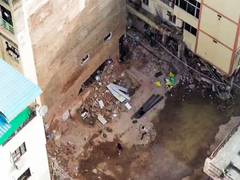 
      
      Delhi building collapse: 3 truckloads of debris filled basement
      
      