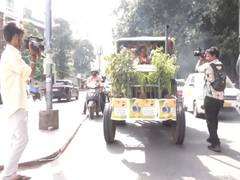 
      
      Telangana BJP MLAs drive tractors to Assembly, demand implementat
      
      