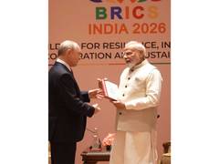 
      
      PM Modi gifts sacred Tamil scripture to Putin
      
      