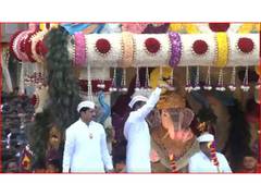 
      
      Devotees witness Shreemant Dagdusheth Halwai Ganpati procession
      
      