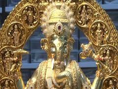 
      
      Gold-plated Ganesha idol studded with 3.83 lakh american diamonds
      
      