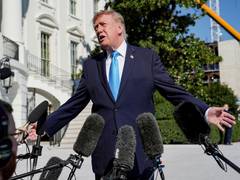 Trump warns Iran, open to direct talks