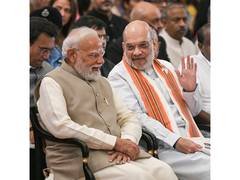 Amit Shah Congratulates PM Modi on 25 Years in Public Service