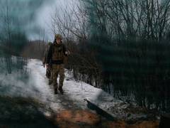 
      
      Russian troops cross Crimean bridge on way to permanent...
      
      