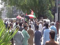 
      
      Taliban kill three during protest for carrying Afghan...
      
      