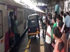 
      
      Man drives auto on Virar railway platform to help woman in...
      
      