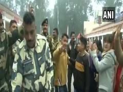 
      
      Jammu: BSF jawans cut cake with locals to welcome New Year
      
      