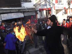 
      
      Student union of ruling NCP rival faction burns effigy of...
      
      