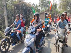 
      
      A day after Mamata Banerjee, Smriti Irani drives scooty...
      
      