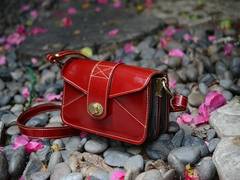 
    160 designers come together to create a single handbag
    