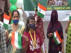 
      
      Sex workers celebrate Independence Day waving Indian flags 
      
      