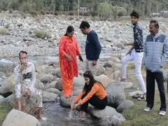 
      
      Tourists returning to Kashmir valley after withdrawal of...
      
      