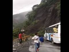 
      
      Narrow escape for bus carrying 14 passengers after landslide...
      
      