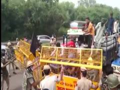 
      
      Police baton-charge people protesting over delay in paddy...
      
      