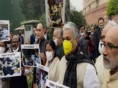 
      
      BJP MPs protest at Parliament over 'unruly' Opposition behaviour 
      
      