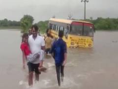 
      
      School bus stuck in water in Mahabubabad, following heavy rain
      
      