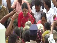 
      
      Chennai: Sasikala distributes relief material in...
      
      