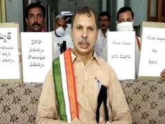 
      
      Andhra Cong leaders protest against hike in power tariff
      
      