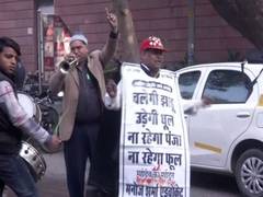 
      
      AAP supporters gather outside Kejriwal's residence to...
      
      