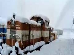 
      
      Srinagar: Railway workers carrying out track maintenance...
      
      