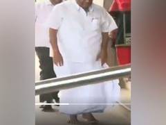 
      
      K'taka Min HD Revanna arrives barefoot at state assembly
      
      