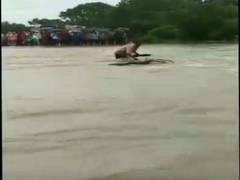 
      
      MP: Man gets washed away while trying to cross overflowing...
      
      