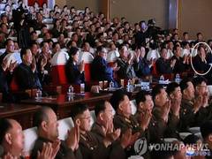 
      
      'Purged' top NK envoy seen with Kim Jong-un at a show 
      
      