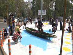 
      
      Students put up graffiti on Srinagar roads to beautify city
      
      