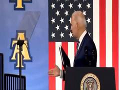 
      
      Social media reacts as Biden shakes hands with thin air
      
      