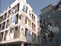 
      
      Artists make wall paintings on street exhibition in Kolkata...
      
      