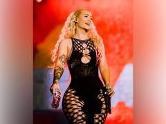 
      
      Iggy Azalea announces return to music career
      
      