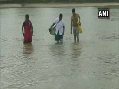 
      
      Chhattisgarh: Woman health worker wades through to provide...
      
      