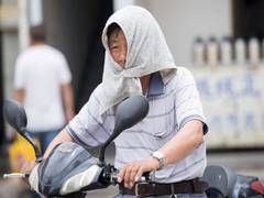 
      
      Post floods, China issues yellow alert for high temperatures
      
      