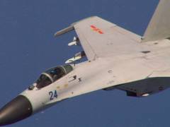 
      
      Chinese jet's aggressive manoeuvre endangers Australian plane
      
      