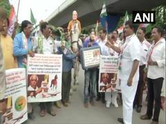 
      
      Karnataka: Congress-JDS workers stage protest, allege...
      
      
