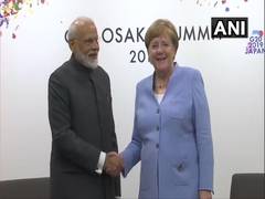 
      
      Modi, Merkel meet on G-20 sidelines, discuss various issues 
      
      