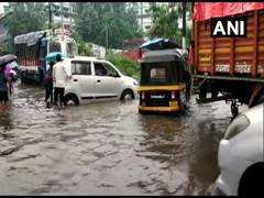 
      
      Heavy rains continue to lash Mumbai, high tide likely 
      
      