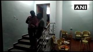 
      
      I-T raids at Kanimozhi's residence, DMK workers protest outside
      
      