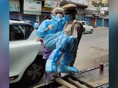 
      
      Delhi cop helps 82-year-old woman receive COVID jab, says...
      
      