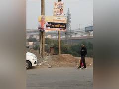 
      
      Posters turning 1,731 unauthorised colonies into authorised...
      
      