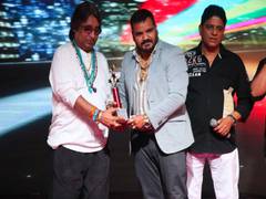 
      
      Dilip Sen hands Rupesh R Pandey 'Business of the Year' award
      
      