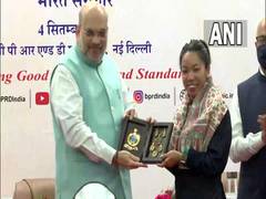 
      
      Amit Shah felicitates Olympics medalist Mirabai Chanu in Delhi
      
      