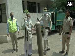 
      
      Delhi police personnel help needy get oxygen refills during...
      
      