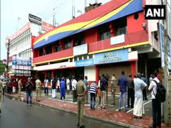 
      
      Kerala: Liquor shops witness long queues after lockdown curbs ease
      
      